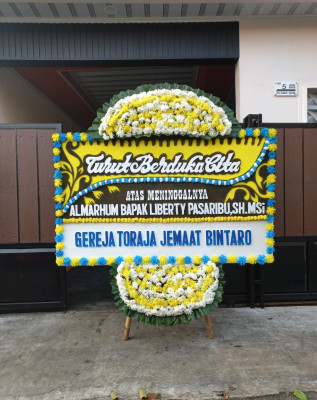 Papan Bunga Duka di Liwuto